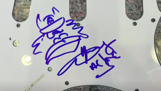 Authentic Angus Young  Autograph Exemplar