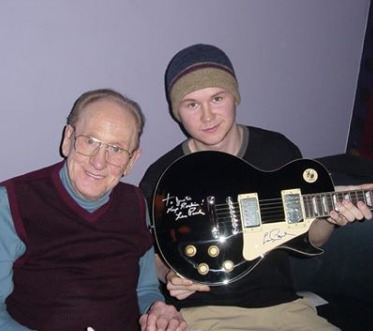 Justin with Electric Guitar and Multi-track recording inventor, Les Paul